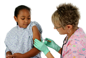 Nurse giving children shot with green gloves